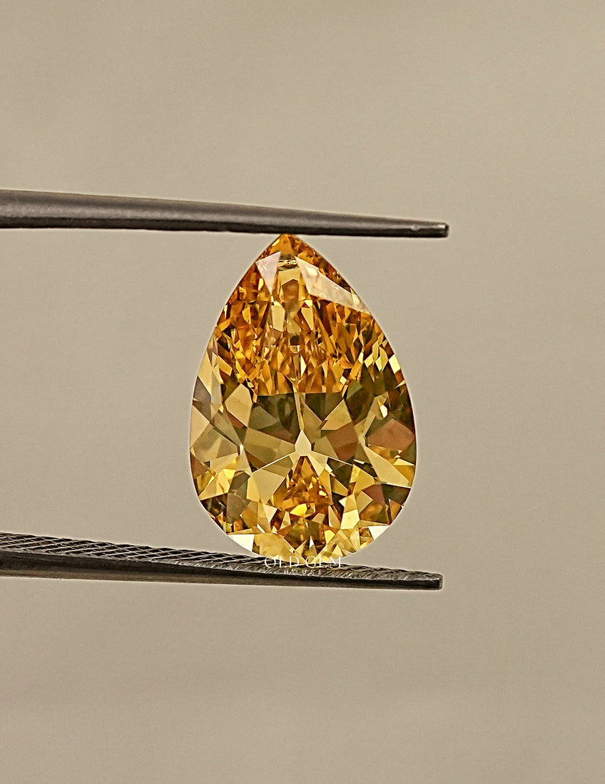 Fancy Vivid Yellow Old Mine Pear Cut Loose Diamond