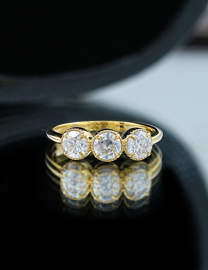 OEC Round Cut Trilogy Ring