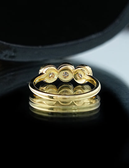 OEC Round Cut Trilogy Ring