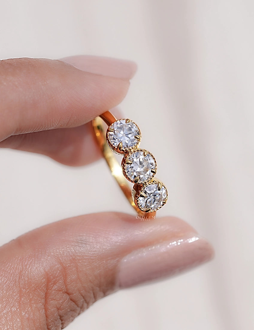 OEC Round Cut Trilogy Ring