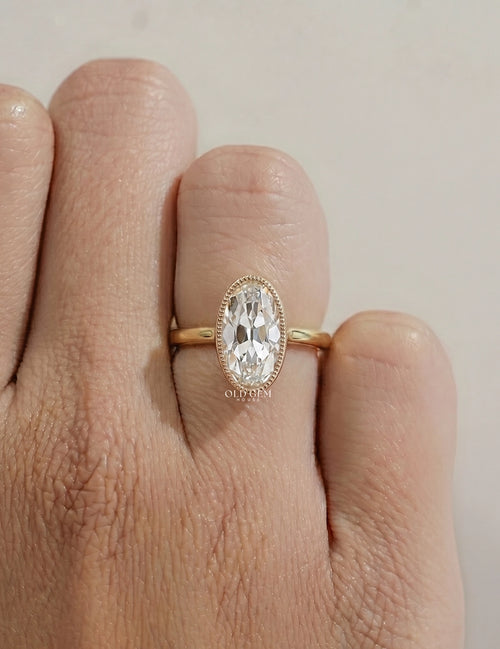 Mid Century Old Mine Moval Cut Engagement Ring