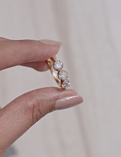 OEC Round Cut Trilogy Ring